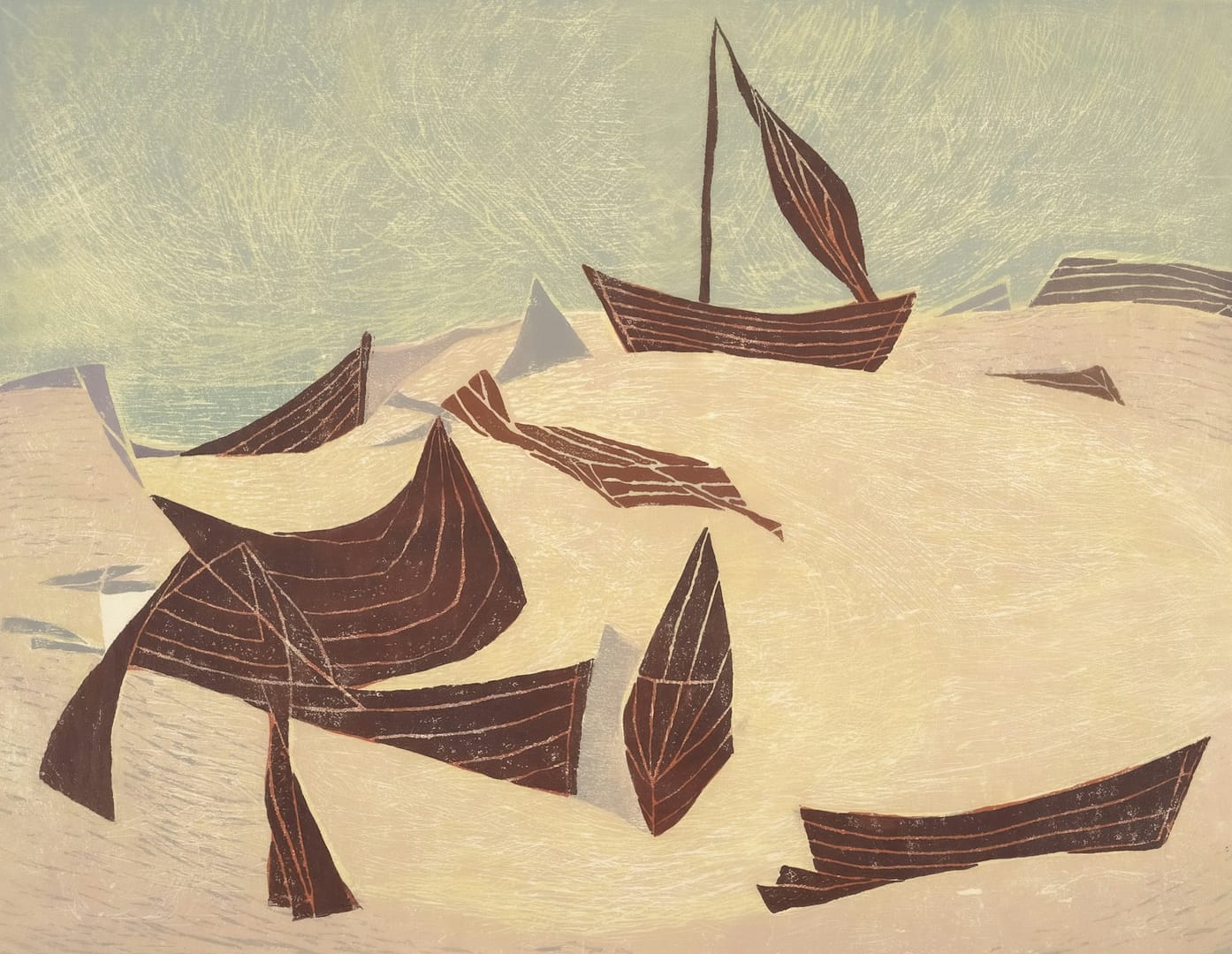 Boats rest on a beach.